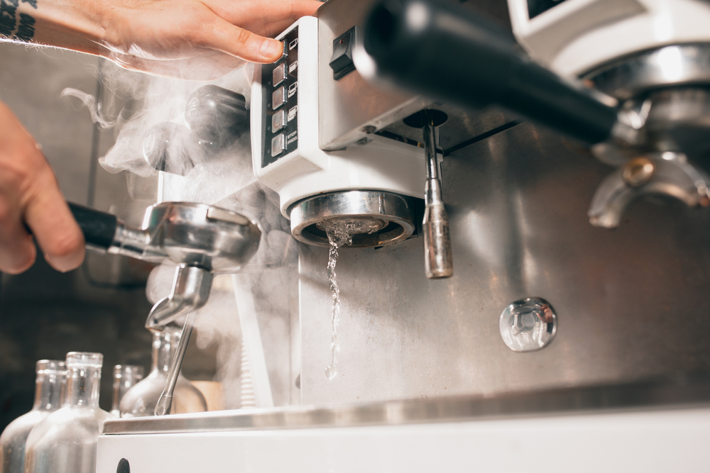 Making Hot Aromatic Coffee in Coffee Machine